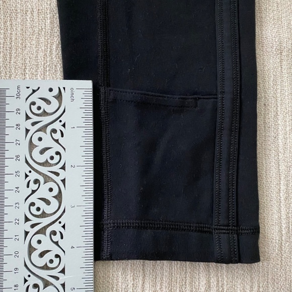 Lululemon Black Leggings Size 2, pocket at left lower leg - Picture 5 of 5